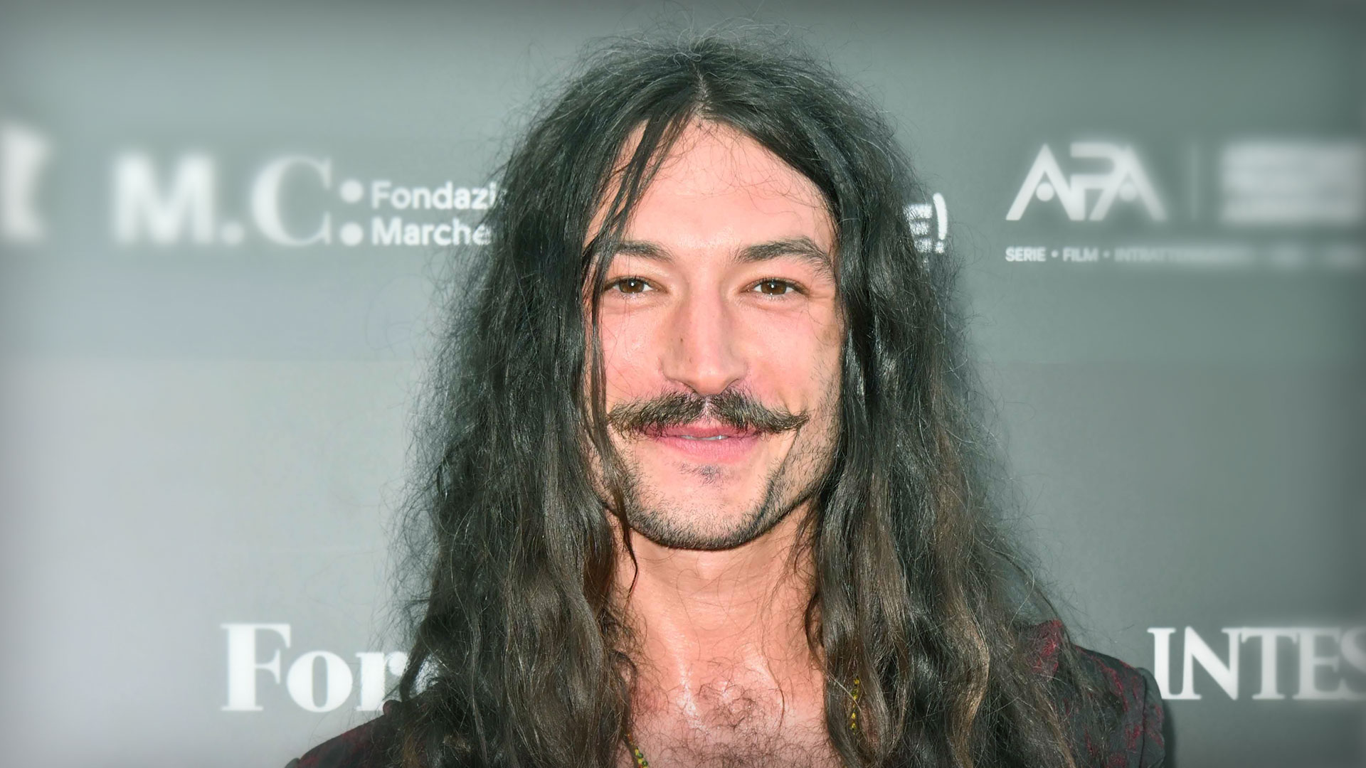 Ezra Miller Is Almost Unrecognizable in New Photos from Italy